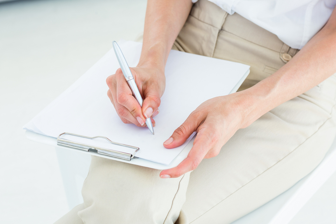 Therapist taking notes