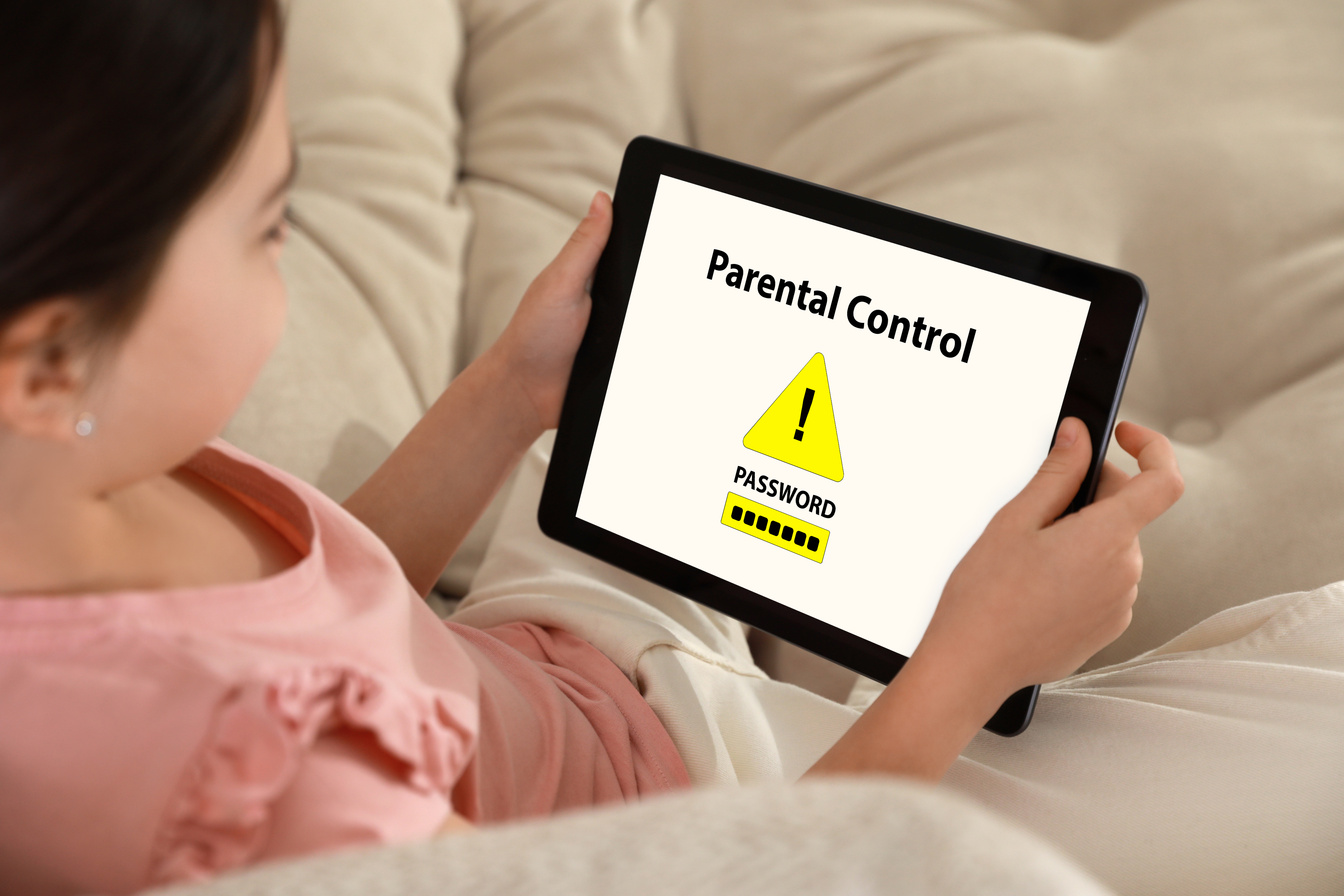 Little Girl Having Access Restriction by Parental Control on Tab